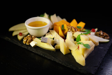 Assorted fruit on a black background