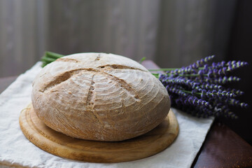 fresh homemade bread on a wooden board close up