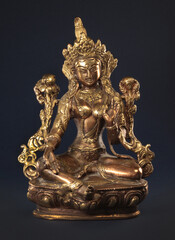 Bronze statuette in the form of the Indian deity Tara, meaning the Divine Mother - obrazy, fototapety, plakaty
