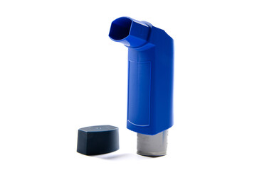 Asthma inhaler isolated on a white background.Close-up. Side view.