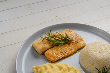 Fish. Tilapia fillet with white rice and mashed potatoes. Set meal.