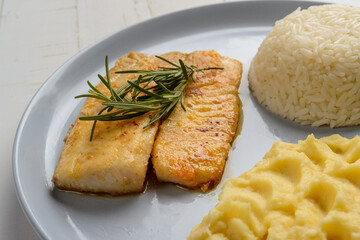 Fish. Tilapia fillet with white rice and mashed potatoes. Set meal.