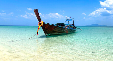 Fototapeta na wymiar Long Boat and Bamboo Island, Andaman Sea, Thailand