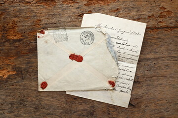 Old Envelope and Letter on a original 1800s wooden background