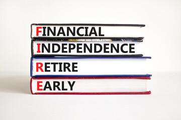 FIRE financial independence retire early symbol. Concept words FIRE financial independence retire...