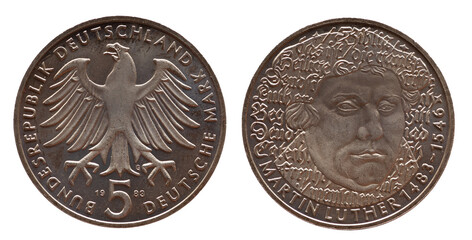 Germany - circa 1983 : a 5 German Mark coin of the Federal Republic of Germany with the cote of arm...