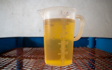 Cooking oil in a measuring glass