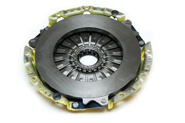 The brand new sport clutch for the car engine isolated in a white background. 