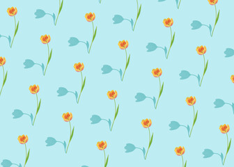 Spring season pattern concept with fresh blossoming colorful tulips on bright blue background. Floral natural idea, surreal shadow visual effect.
