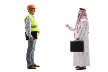 Mature male site engineer and a saudi arab businessman having a conversation