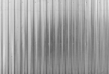 Shiny ridged metal wall, background texture