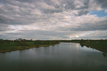 Obraz premium landscape with river Lielupe near Jelgava town, Latvia inspring evening