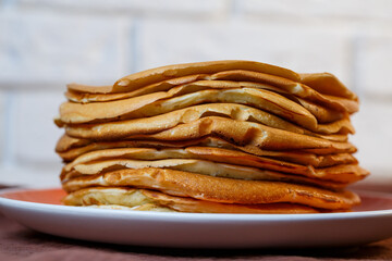 Delicious homemade fried pancakes with natural ingredients, plate with homemade pancakes