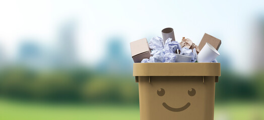 Cute smiling recycling bin full of paper waste