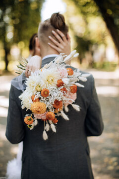 Beautiful wedding bouquet of wildflowers in a rustic style