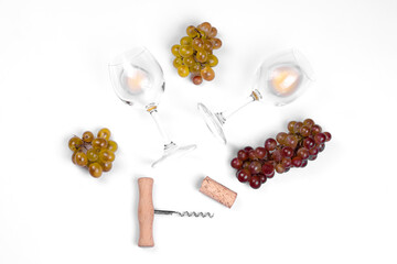 Wine flat lay, top view abstract composition.  glass of wine, corkscrew and grapes with copy space...
