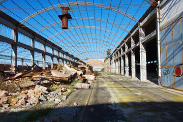 Old abandoned and decaying factory, now everything is corroded by rust and time decomposes...