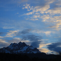 Obraz premium Sun lit clouds over Mount Pilatus, Switzerland.