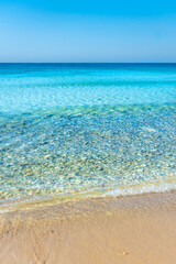 Beautiful crystal clear water in Pescoluse Beach, Salento, Apulia Italy