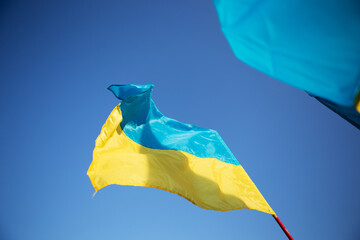 yellow - blue flag of Ukraine on blue sky background