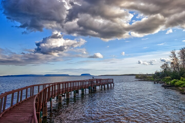 Vast lake looks like an ocean under the evening sky with beautiful clouds - Lake Superior - Thunder Bay, ON, Canada