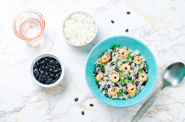 Black beans cilantro shrimp lime rice in a bowl