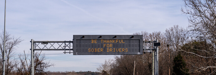 electronic highway sign with Be Thankful for Sober Drivers message