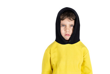 On a white background portrait of a little boy 6 years old, the boy is very hurt and he is sad, the concept of health in children, the preservation of children's rights, anti-violence