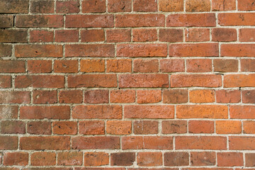 Obraz premium Old red brick wall texture. Background of a old brick house.