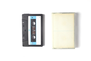 Retro audio cassette tape from the 80s and 90s on a white background.