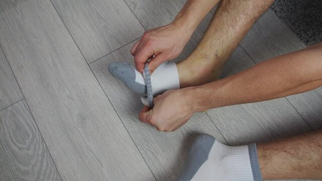 Ankle injury with dislocation and sprains. Fracture or Leg sprain injury of young sports man. 