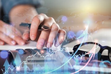 Double exposure of business man hand touching with business financial virtual chart marketing concept