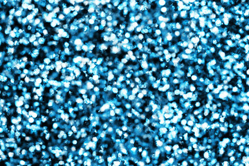 Blue shiny stars background. Night sky texture. Glittering dots and spots pattern. Glamour glowing magic backdrop. Blinking festive design.
