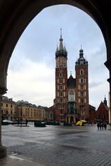 Naklejka premium Krakow, Poland. St. Mary's Basilica on the Krakow Main Square (Rynek Glowny), Poland