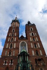 Fototapeta na wymiar Krakow, Poland. St. Mary's Basilica on the Krakow Main Square (Rynek Glowny), Poland