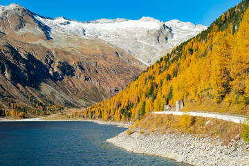Mountains road autumn lake Alps - 492889250