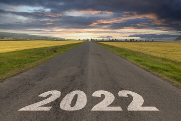 2022 text on asphalt road