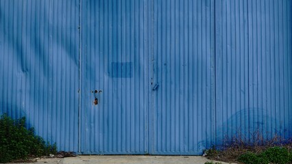 metal blue door from industrial building