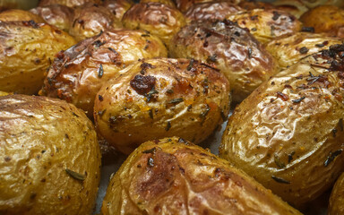 Macro view of baked potatoes with dill.
