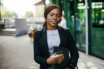 Portrait Of Businesswoman Holding Purse