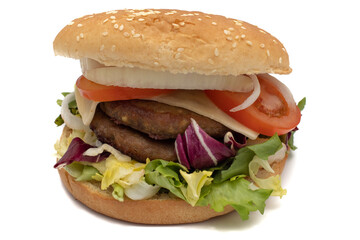 A double meat burger, with the ingredients, lettuce, cabbage, cucumber, tomato, onion, cheese, ketchup, mayonnaise. Isolated on white background. One of the most consumed snacks in the world.