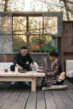Young man and young woman having dinner in a restaurant