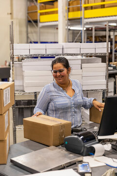 Modern warehouse production facility with worker 