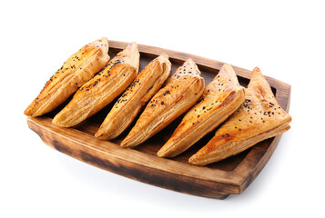 Board with tasty Uzbek samsa on white background