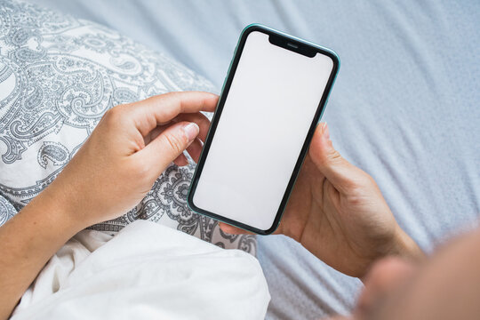 Mockup of a smartphone in female hands