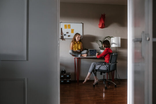 Mother and daughter at home together