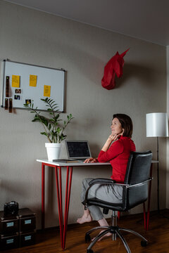 Freelancer with a laptop at home