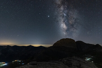Fototapeta na wymiar The milkyway galaxy over Olympos mountain, from different angles. Hiking at night to explore wanderfull views.