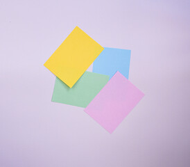 Colorful paper note over a white background. Reminder paper