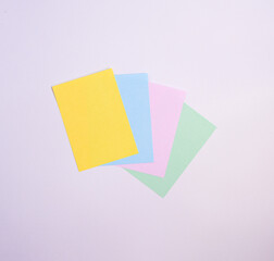 Colorful paper note over a white background. Reminder paper
